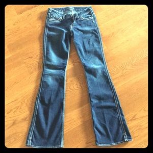 Woman’s silver jeans